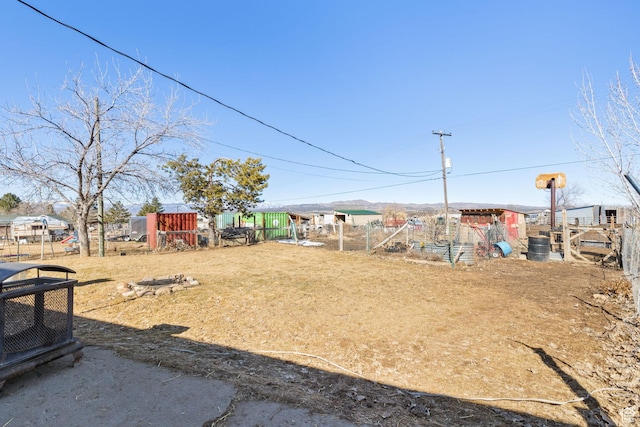 879 E Main St, Mount Pleasant, UT 84647 - view of yard featuring an outdoor structure and fence