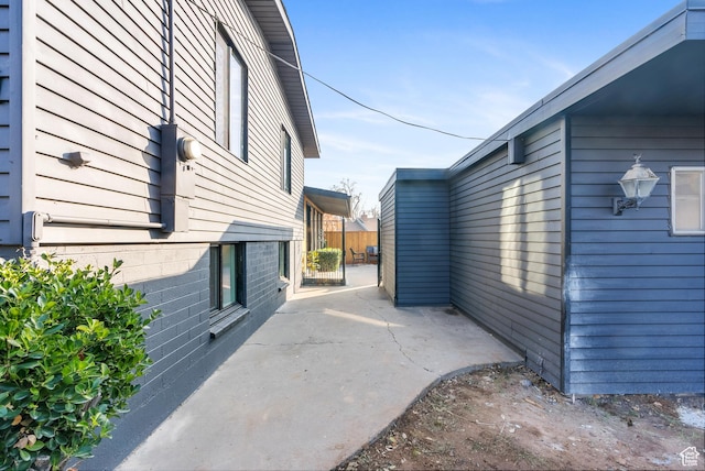 1379 E Sumac Way, Murray, UT 84121 - view of home's exterior featuring a patio area