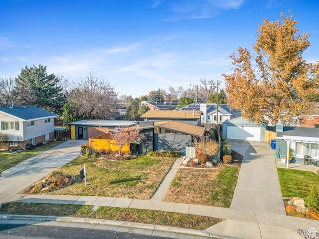 1379 E Sumac Way, Murray, UT 84121 - view of front of property with concrete driveway, a detached garage, and a residential view