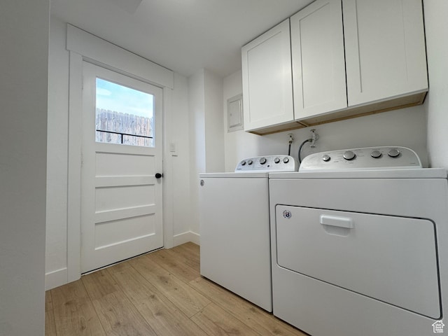 1379 E Sumac Way, Murray, UT 84121 - laundry room with cabinet space, washing machine and clothes dryer, and light wood-style flooring
