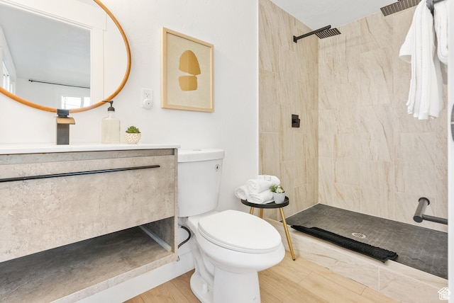 1379 E Sumac Way, Murray, UT 84121 - full bath with toilet, tiled shower, vanity, and wood finished floors