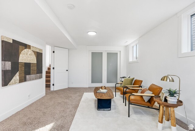 1379 E Sumac Way, Murray, UT 84121 - sitting room featuring carpet floors, stairway, and baseboards