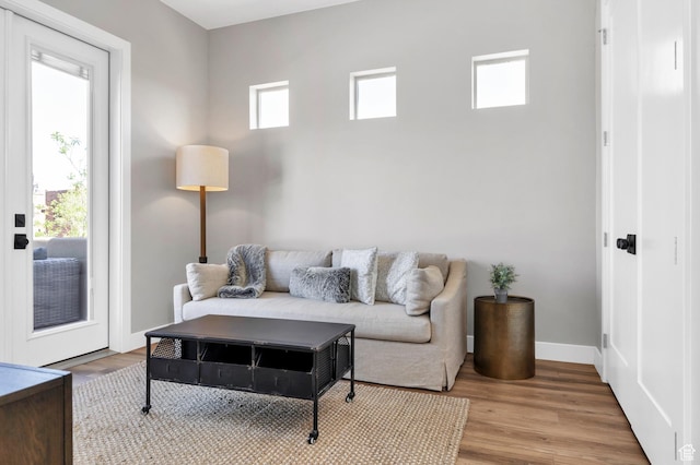 5417 W Copper Cliffs Way, Hurricane, UT 84737 - living room featuring baseboards, wood finished floors, and a wealth of natural light