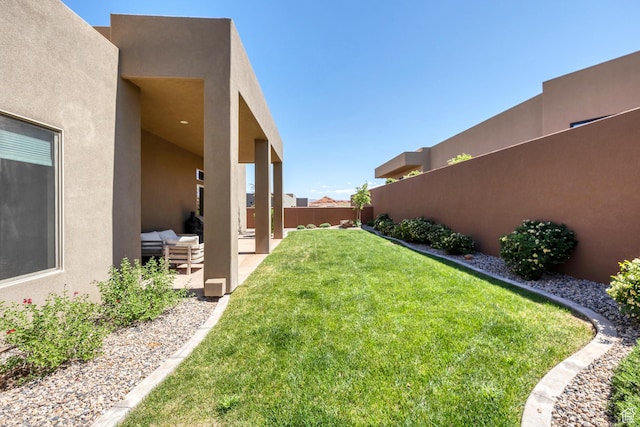 5417 W Copper Cliffs Way, Hurricane, UT 84737 - view of yard featuring a patio and a fenced backyard