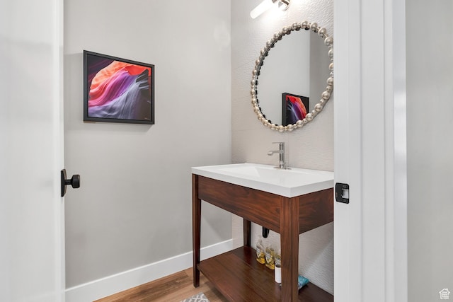 5417 W Copper Cliffs Way, Hurricane, UT 84737 - bathroom featuring baseboards, wood finished floors, and vanity