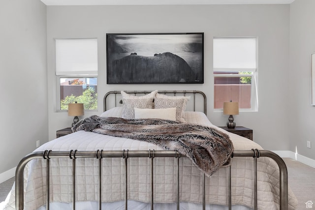 5417 W Copper Cliffs Way, Hurricane, UT 84737 - bedroom with carpet floors, multiple windows, and baseboards