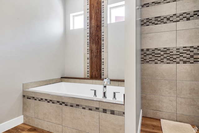 5417 W Copper Cliffs Way, Hurricane, UT 84737 - bathroom with wood finished floors and a garden tub