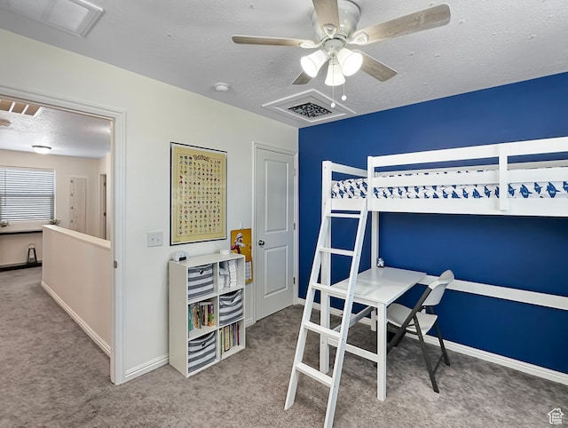 2095 W 3330 S, Syracuse, UT 84075 - carpeted bedroom featuring a textured ceiling, baseboards, and a ceiling fan