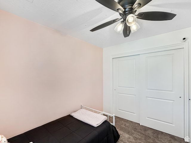 2095 W 3330 S, Syracuse, UT 84075 - bedroom featuring dark carpet, a closet, and ceiling fan