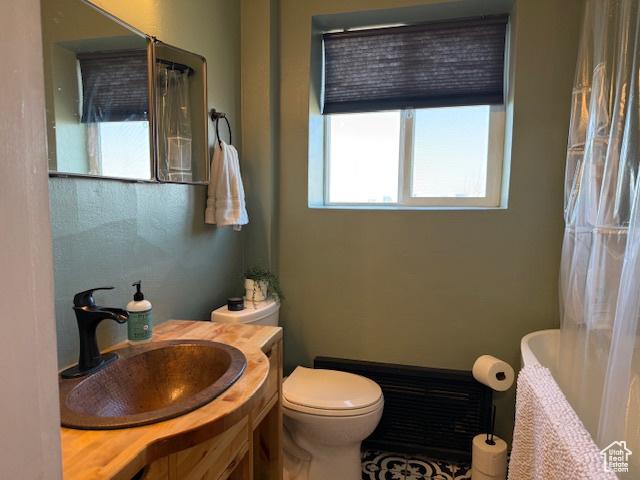 130 S 1300 E Unit 602, Salt Lake City, UT 84102 - bathroom with toilet, vanity, and a shower with shower curtain