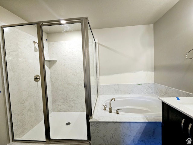 3102 N 2875 W Unit 27, Plain City, UT 84404 - bathroom featuring vanity, a shower stall, and a bath