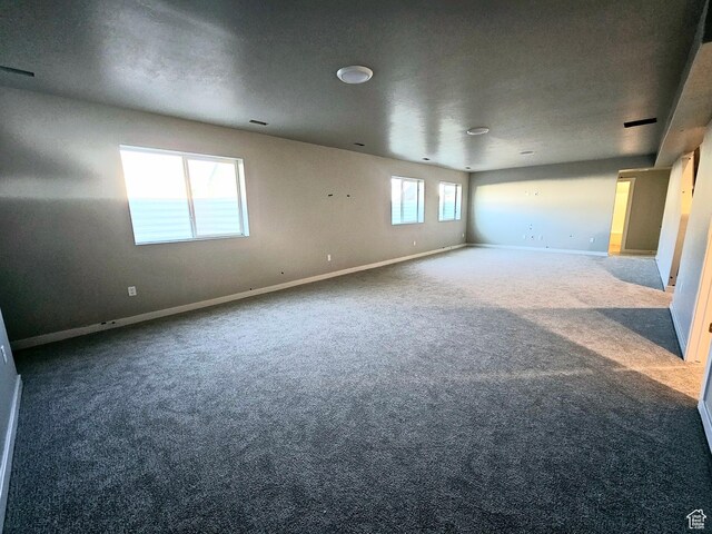 3102 N 2875 W Unit 27, Plain City, UT 84404 - spare room featuring carpet floors and baseboards