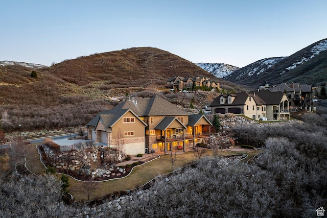14794 S Vintage View Ln, Draper, UT 84020 - exterior space with a garage, stone siding, a mountain view, and stucco siding