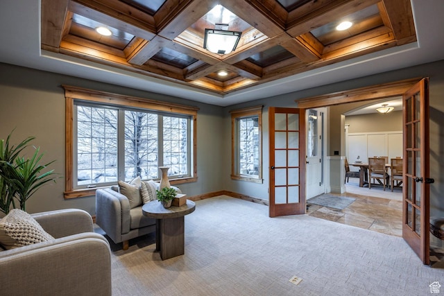 14794 S Vintage View Ln, Draper, UT 84020 - living area featuring light carpet, baseboards, arched walkways, coffered ceiling, and french doors