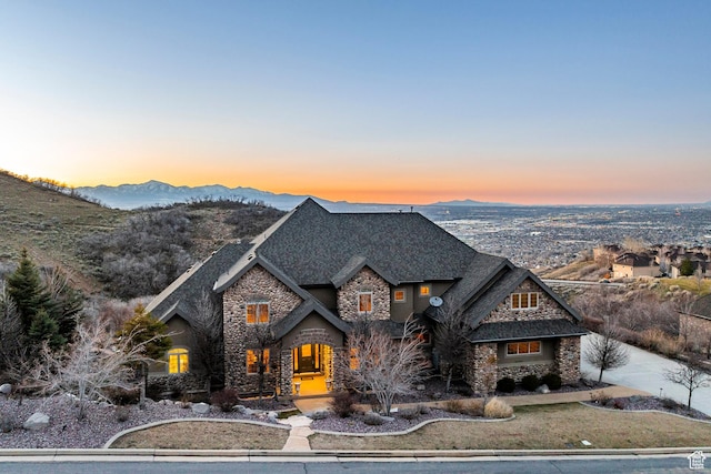 14794 S Vintage View Ln, Draper, UT 84020 - view of front facade with a shingled roof, stone siding, and a mountain view