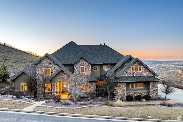 14794 S Vintage View Ln, Draper, UT 84020 - view of front of home featuring stone siding, a front yard, and roof with shingles