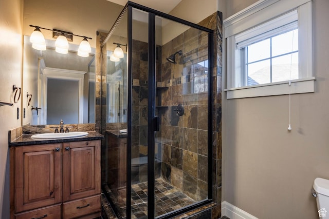 14794 S Vintage View Ln, Draper, UT 84020 - full bathroom with toilet, a shower stall, baseboards, and vanity