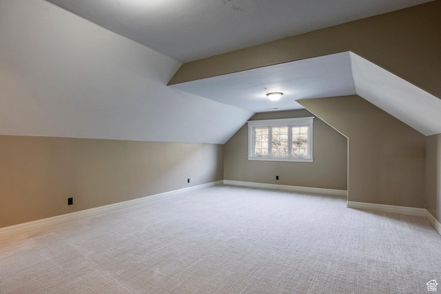 14794 S Vintage View Ln, Draper, UT 84020 - additional living space with light colored carpet, vaulted ceiling, and baseboards