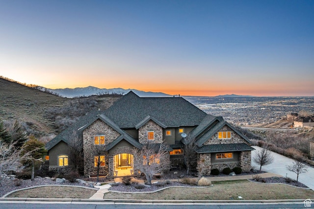 14794 S Vintage View Ln, Draper, UT 84020 - view of front of home featuring stone siding, a shingled roof, and a mountain view
