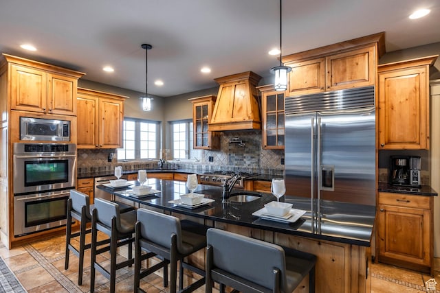 14794 S Vintage View Ln, Draper, UT 84020 - kitchen featuring built in appliances, recessed lighting, a sink, custom exhaust hood, and glass insert cabinets