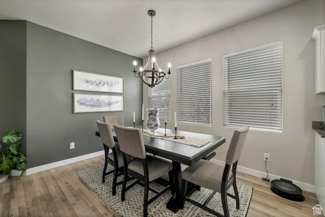 721 S Jubilee Dr, Saratoga Springs, UT 84045 - dining space featuring baseboards, a notable chandelier, and light wood finished floors