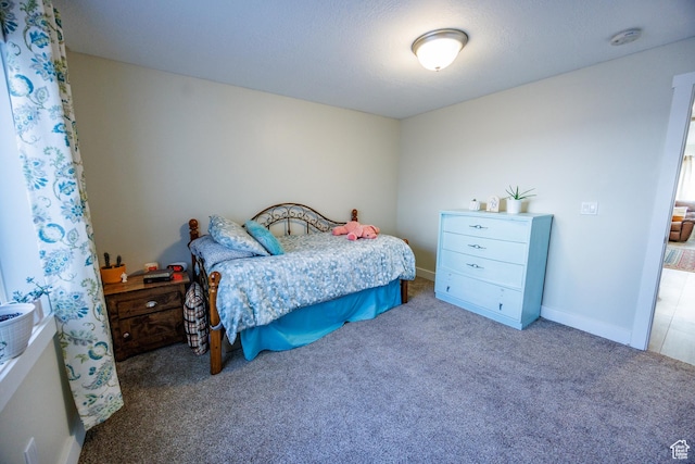 7912 N Secretariat Rd, Eagle Mountain, UT 84005 - carpeted bedroom featuring baseboards