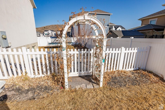 7912 N Secretariat Rd, Eagle Mountain, UT 84005 - view of yard with a mountain view, a trampoline, and fence