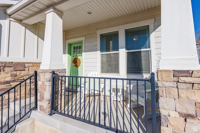 7912 N Secretariat Rd, Eagle Mountain, UT 84005 - entrance to property with stone siding and a porch