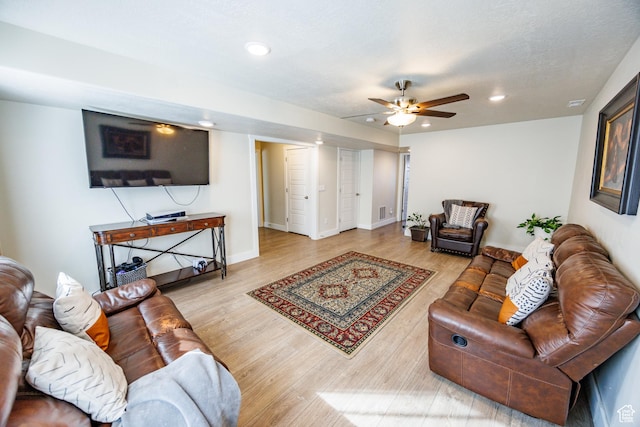7912 N Secretariat Rd, Eagle Mountain, UT 84005 - living room with visible vents, wood finished floors, recessed lighting, baseboards, and ceiling fan