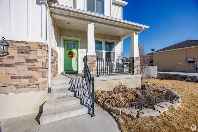 7912 N Secretariat Rd, Eagle Mountain, UT 84005 - property entrance featuring stone siding and a porch