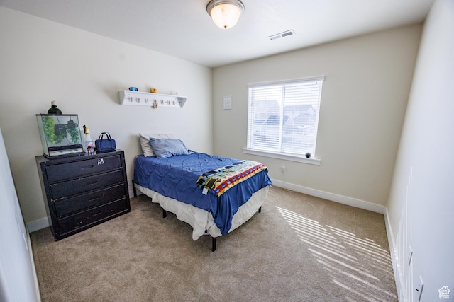 7912 N Secretariat Rd, Eagle Mountain, UT 84005 - carpeted bedroom featuring visible vents and baseboards