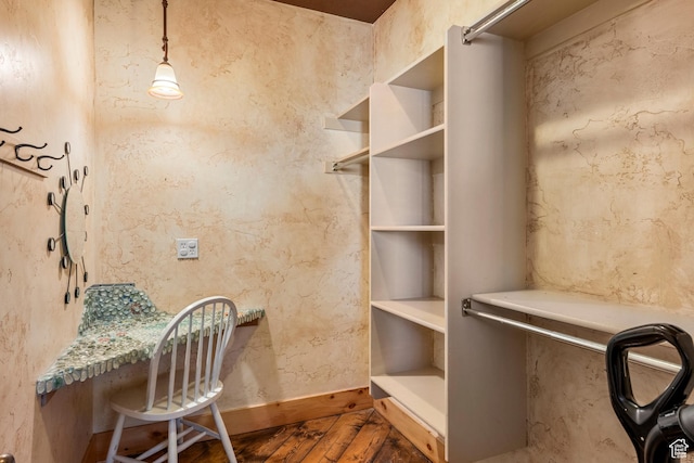 3478 E Porcupine Cir, Garden City, UT 84028 - home office featuring baseboards, wood finished floors, and built in study area