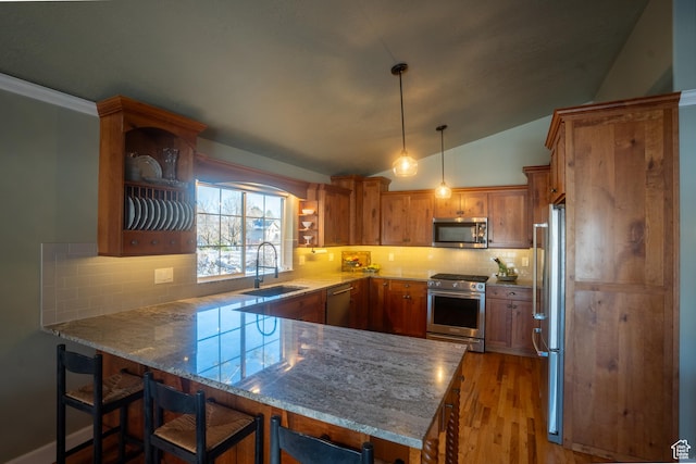 kitchen with a peninsula, stainless steel appliances, a sink, open shelves, and vaulted ceiling