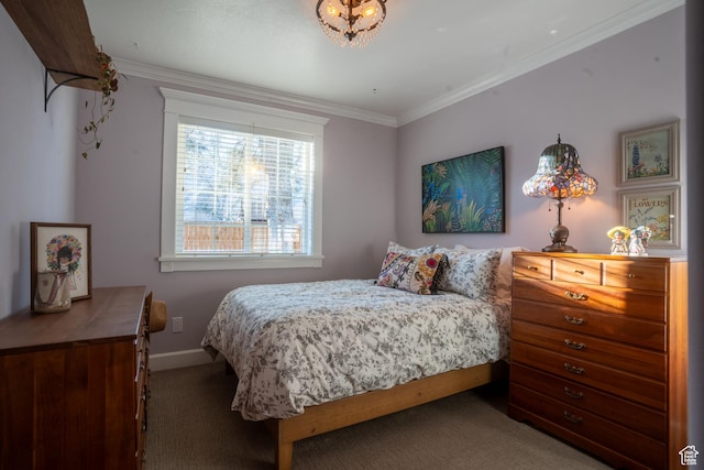 bedroom featuring carpet flooring, crown molding, and baseboards