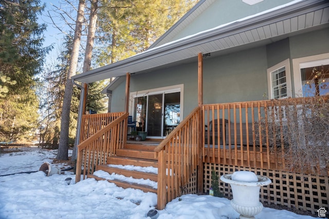 view of snow covered deck
