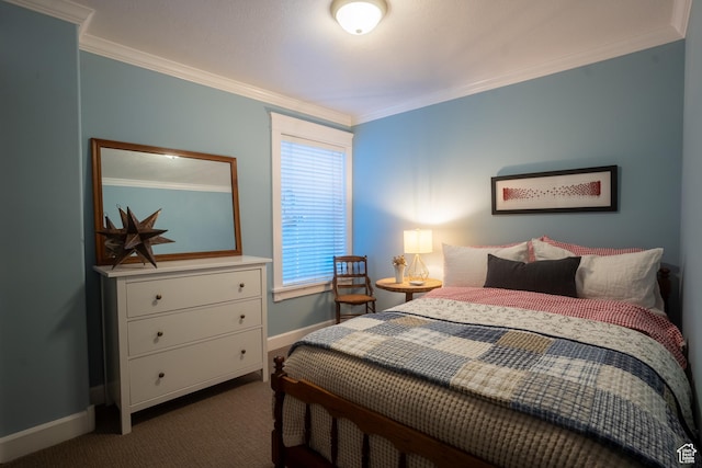 bedroom featuring baseboards, dark carpet, and crown molding