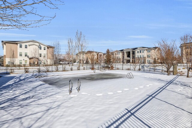 1051 S 500 E Unit E203, Heber City, UT 84032 - yard layered in snow featuring fence and a residential view