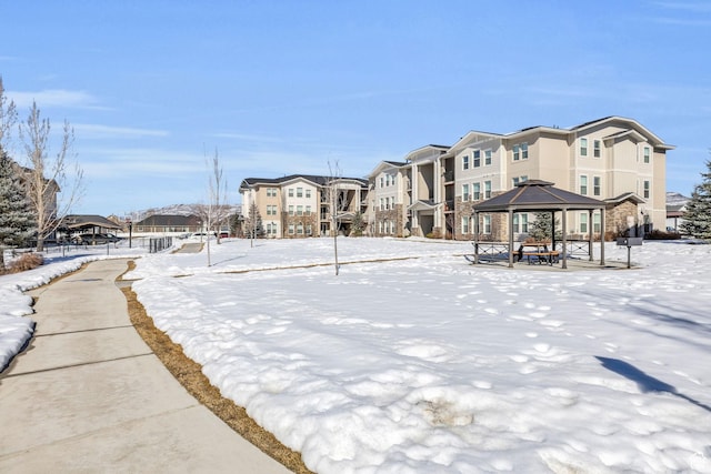 1051 S 500 E Unit E203, Heber City, UT 84032 - yard covered in snow with a gazebo and a residential view