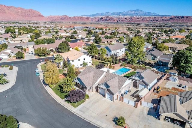 drone / aerial view with a residential view and a mountain view