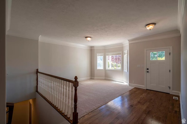 1986 Dove Dr, Santa Clara, UT 84765 - entryway with baseboards, visible vents, ornamental molding, wood finished floors, and a textured ceiling