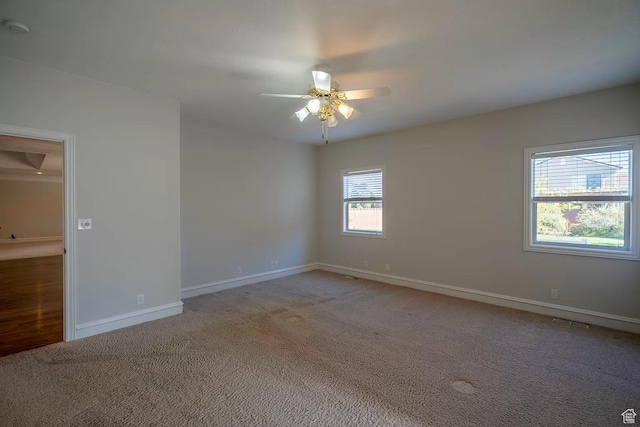 1986 Dove Dr, Santa Clara, UT 84765 - empty room with ceiling fan, carpet, and baseboards