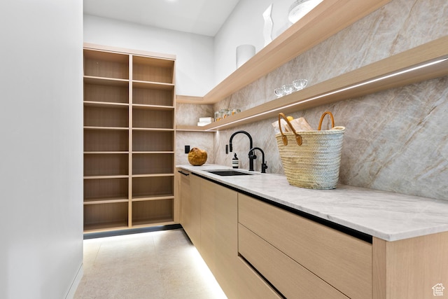 2031 E Pinnacle Dr, St George, UT 84790 - bar featuring tasteful backsplash and a sink