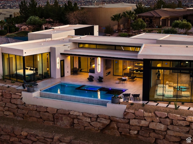2031 E Pinnacle Dr, St George, UT 84790 - rear view of house featuring a patio area, an outdoor pool, and outdoor dining space