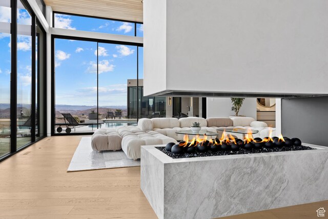 2031 E Pinnacle Dr, St George, UT 84790 - living area with expansive windows and wood finished floors