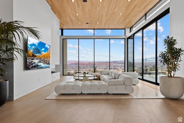 2031 E Pinnacle Dr, St George, UT 84790 - living area with a wall of windows, wood finished floors, and wood ceiling