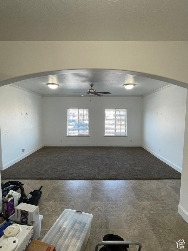 3723 E Rock Creek Rd Unit 7, Eagle Mountain, UT 84005 - carpeted spare room with a ceiling fan, arched walkways, and baseboards