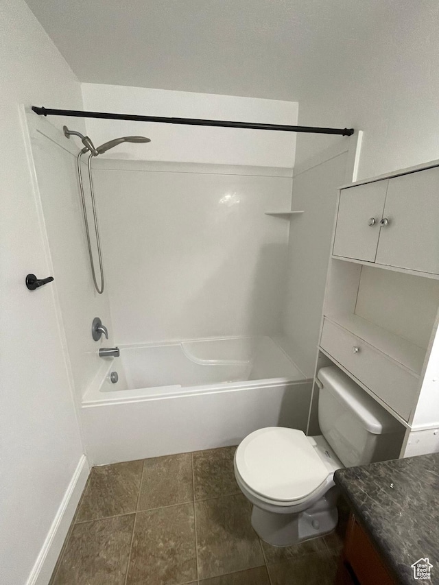 3723 E Rock Creek Rd Unit 7, Eagle Mountain, UT 84005 - bathroom featuring shower / washtub combination, tile patterned flooring, vanity, and toilet