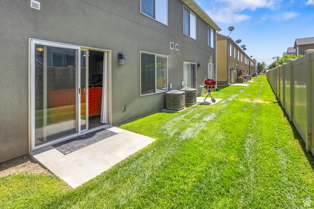 2451 S Gilmour St, West Haven, UT 84401 - view of yard featuring visible vents, fence, and a patio