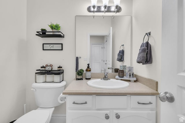 6067 S 3950 W, Roy, UT 84067 - half bathroom with vanity, toilet, and an inviting chandelier
