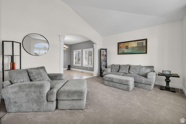6067 S 3950 W, Roy, UT 84067 - carpeted living room featuring arched walkways, ornate columns, high vaulted ceiling, and baseboards